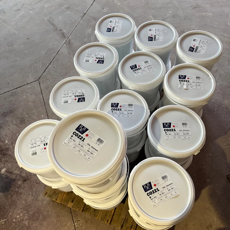 Overhead view of a batch of labelled CO221 casting slip buckets