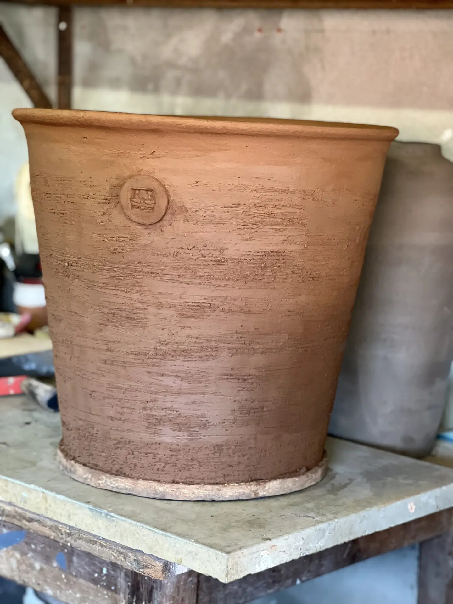 Noron Stoneware pot showing the clay texture and R&B stamp